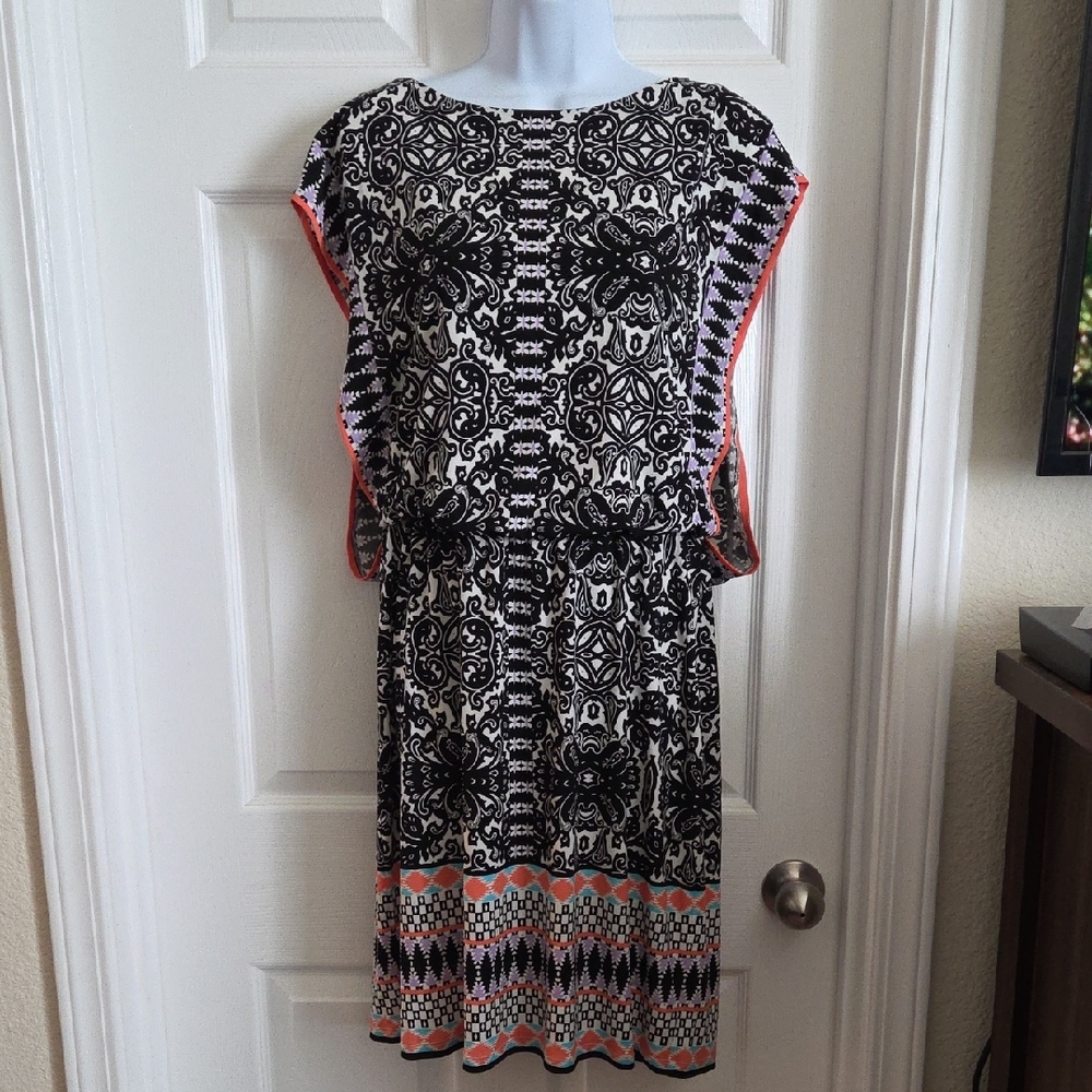 Black and White Patterned Dress with Pink Accents